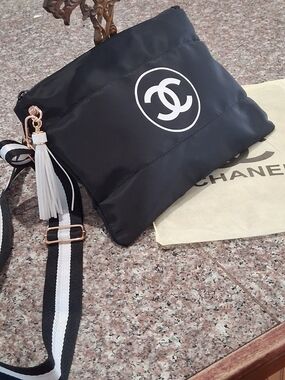 Chanel GWP Black Quilted Crossbody Bag with White Tassel.